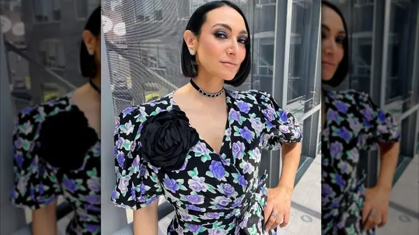 Mana Mansour poses in an oversized rosette brooch