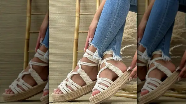 Woman wearing white jute sandals