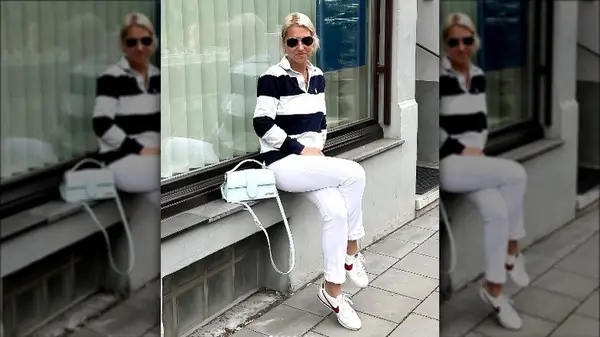 Woman seated and smiling