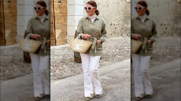 Woman walking in white jeans