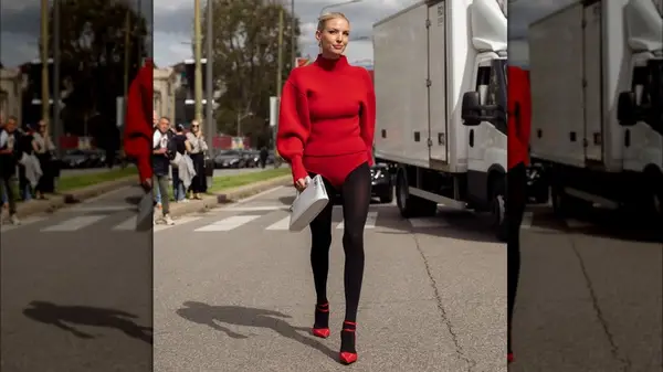 A woman in a red sweater 