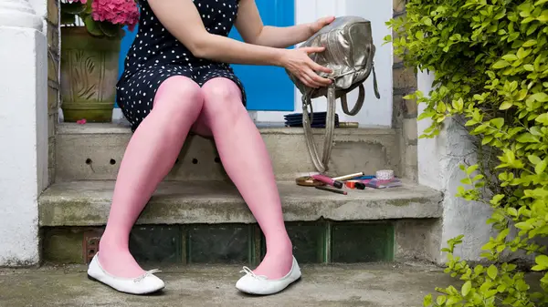 Woman wearing pink tights