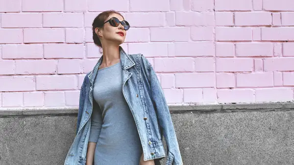 Woman wearing a denim jacket