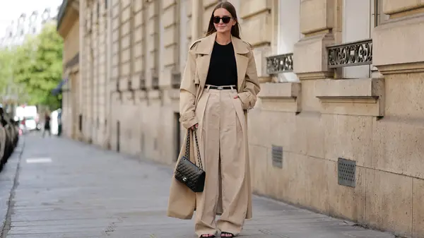 Woman wears oversized trouser slacks