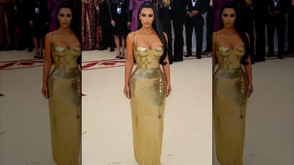 Kim Kardashian in a gold dress at the Met Gala