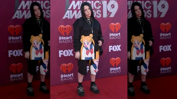 Billie Eilish wearing a black Sailor Moon outfit at the iHeart Radio Music Awards in March 2019