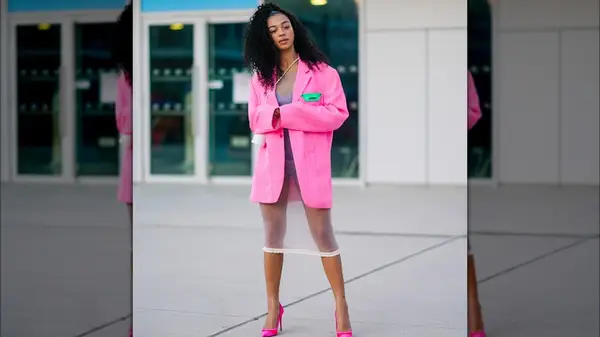 A woman in a sheer dress 