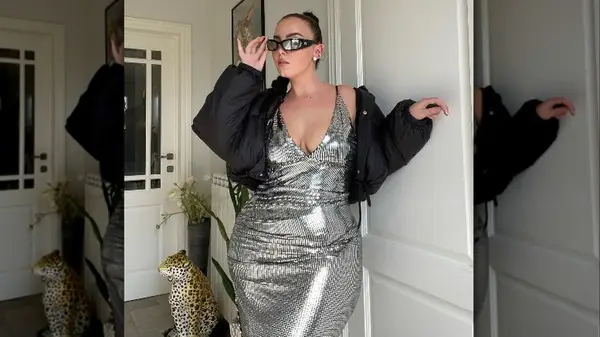 Woman posing in silver dress