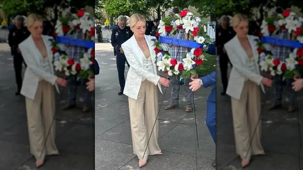 Pam Bondi wearing a broken khaki and white pantsuit