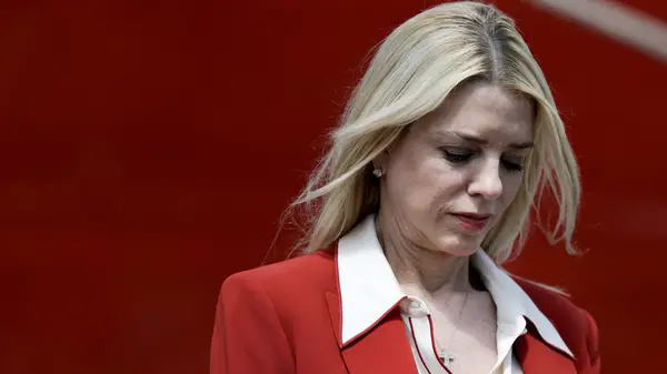 Pam Bondi in a red suit