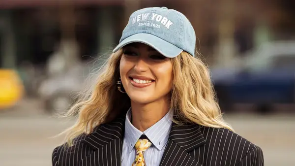 Model wearing baseball cap