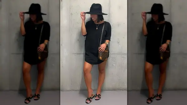 Woman in brimmed hat