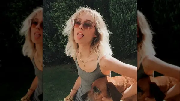 Woman in rose sunglasses 