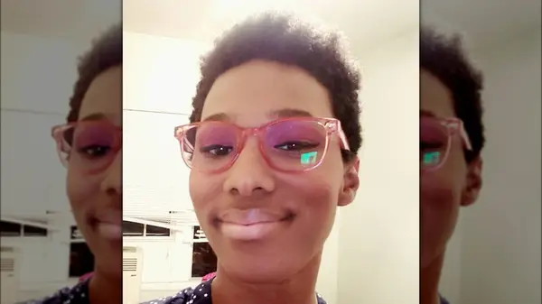 Woman in pink sunglasses 