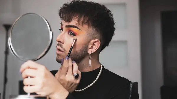 Person applying makeup