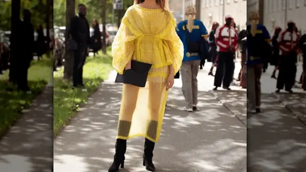 Yellow jumper black boots