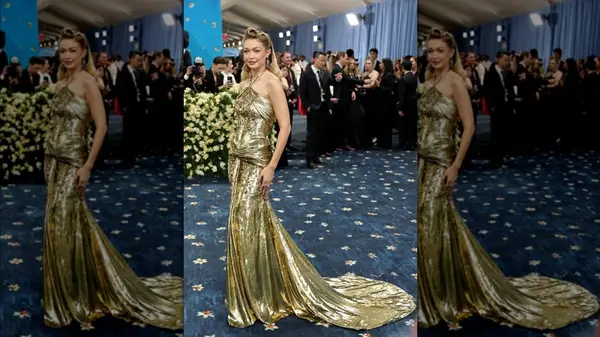 Gigi Hadid on the red carpet in a golden gown