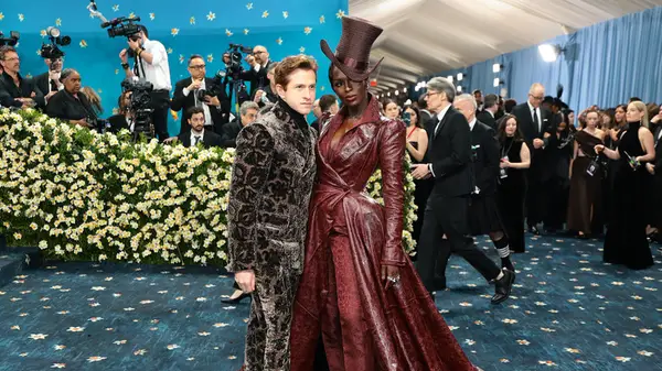 Daniel Lee and Jodie Smith-Turner posing together on the red carpet at the Met Gala red carpet