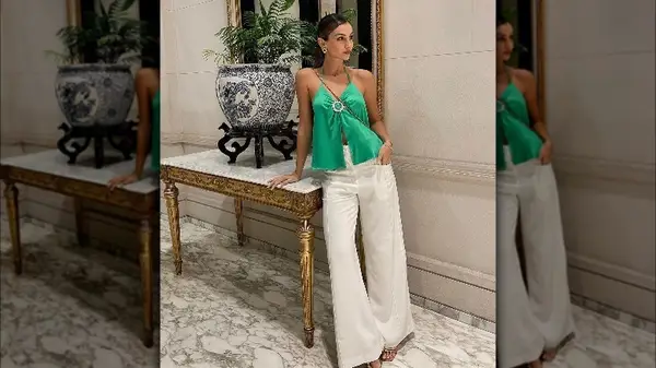 Woman in dressed up white trousers 