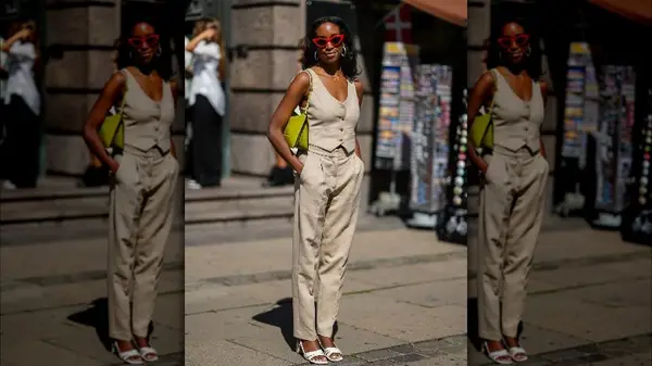 Woman in trousers and vest 