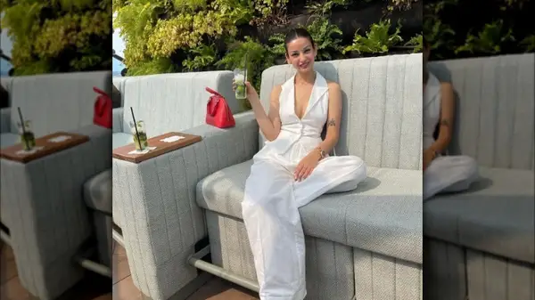 Woman wearing a white vest and pants