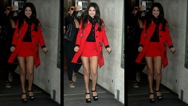 Selena Gomez in London wearing a black and red outfit