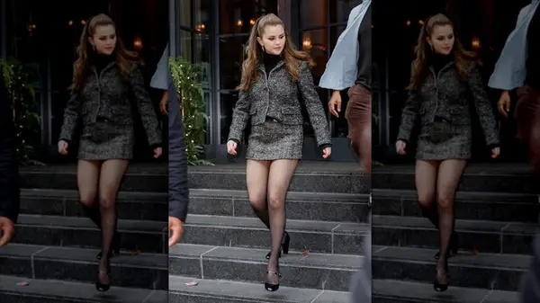 Selena Gomez descending steps in New York