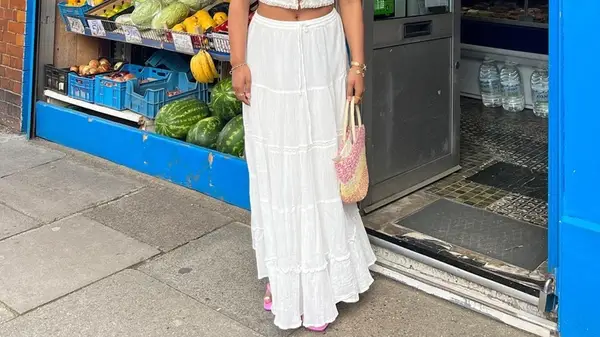 A woman in a tiered boho skirt