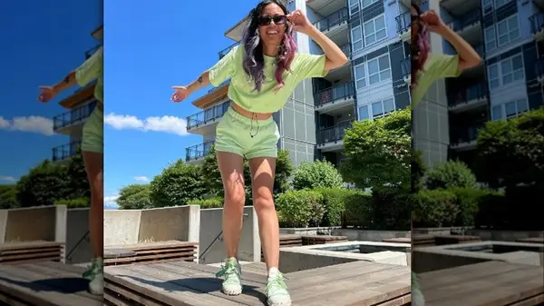 woman in sunglasses smiling