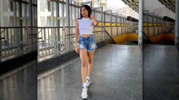 woman posing in shorts