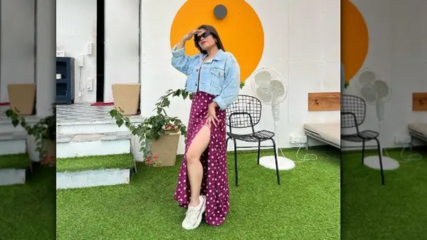 woman posing with leg out