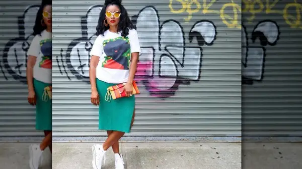 woman in front of grafitti