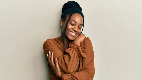 woman hugging herself