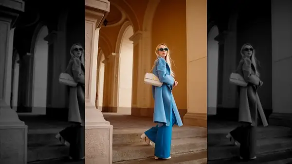 Woman wears ankle boots with blue wide-legged pants