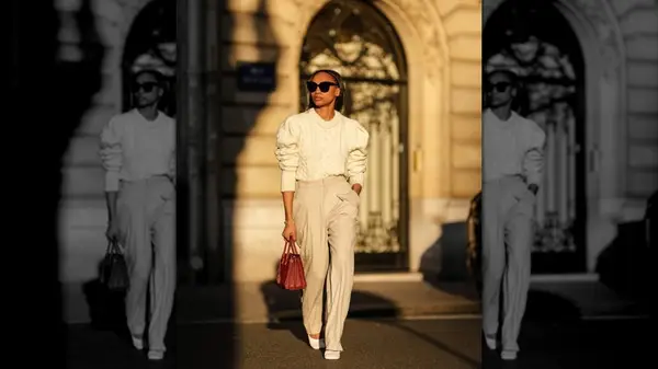 Emilie Joseph wears white mules in Paris in January 2022