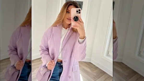 Wearing lavender coat