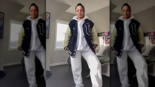 Varsity jacket over hoodie