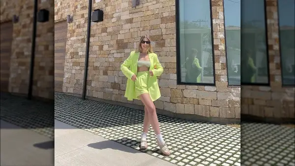 Woman wearing shorts and loafers