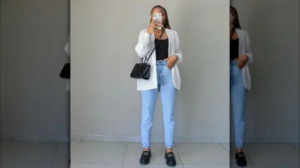 Woman posing in loafers