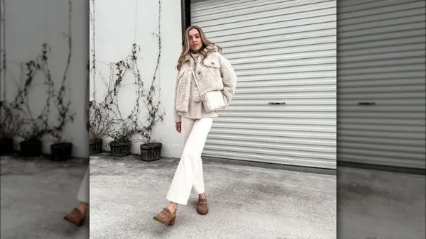Woman wearing a jacket and loafers