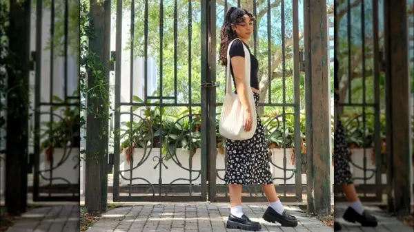Woman wearing a skirt and loafers
