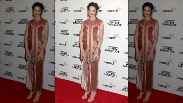 Katie Holmes on the red carpet in a pale pink velvet dress