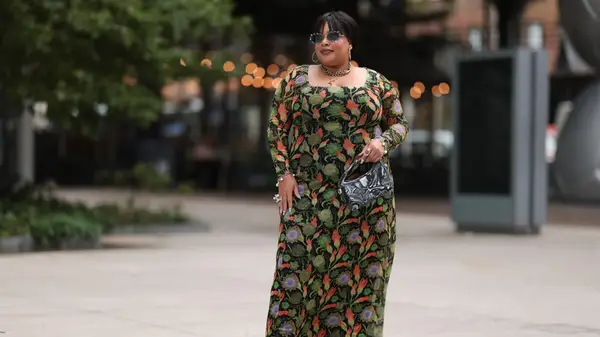 Woman with a little black and white bag 