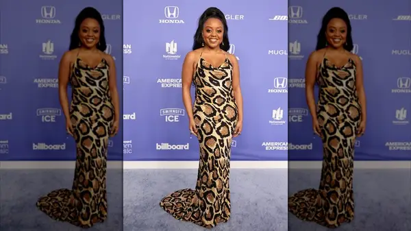 Quinta Brunson in an animal print dress