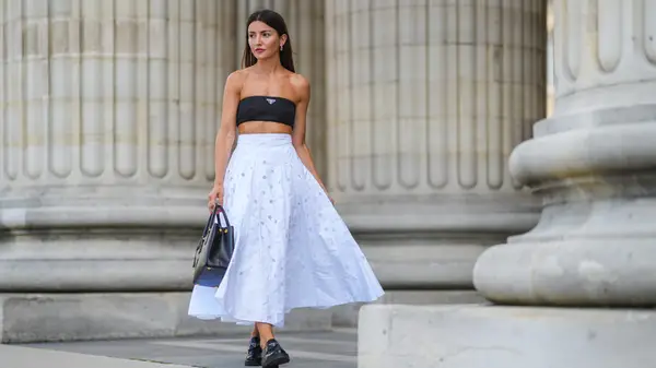 Woman wearing tube top and skirt