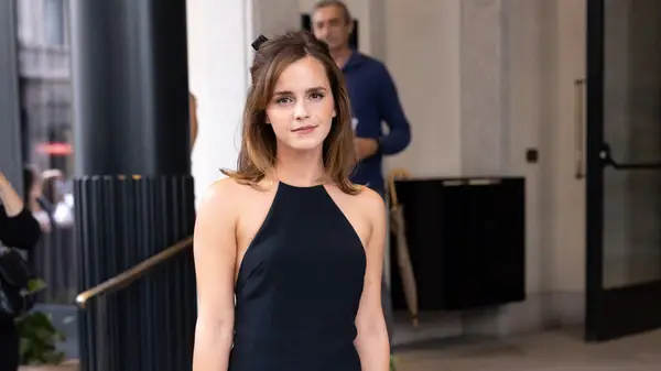 Emma Watson posing for photos