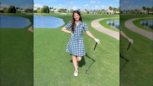 Woman wearing a plaid dress