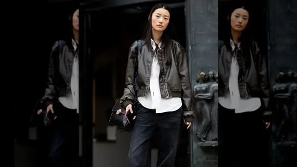 Woman in leather jacket and pants 