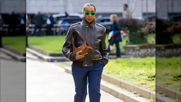 Woman in a brown leather jacket 