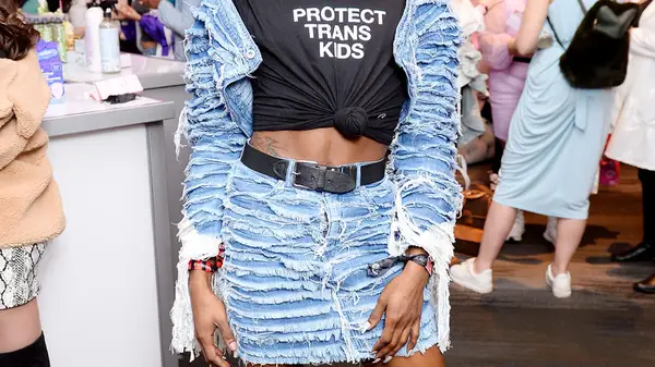 Distressed denim skirt, protect trans kids